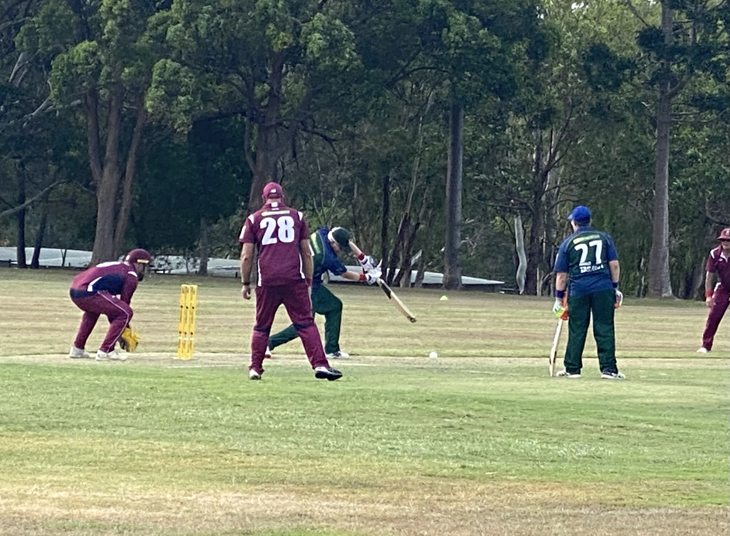 David Hughes playing a cover drive batting against Queensland in the 2023 NCIC