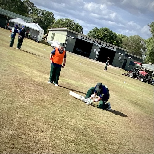 Phil Menzie doing pre-game practice on the side of the ground