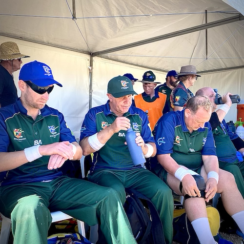 Three of the CATS B1 players lined up in the front of the team tent ready to play