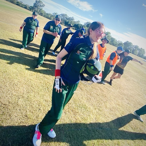 Nicole McKilllop clapped off the ground by teammates after batting