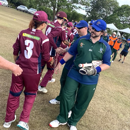 CATS players shaking hands with the Queensland team after the game