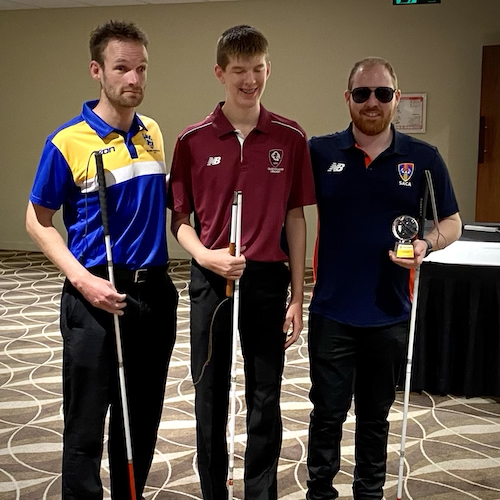 ACCT CATS player Daniel Searle standing with two other players for being awarded best B1 player's of the tournament