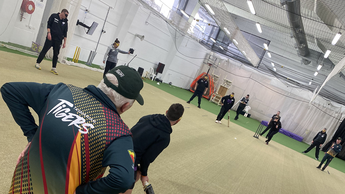 Cricket Tasmania staff batting and bowling at the BCT training session