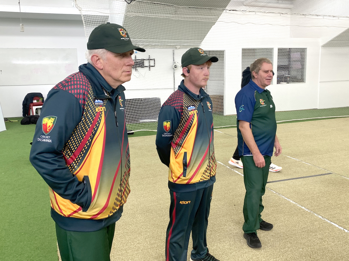 Three Tigers players help train Cricket Tasmania staff at the BCT training session